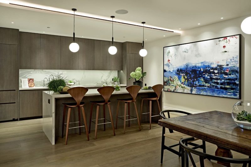 Finished luxury kitchen with integrated recessed ceiling lights and no visible electrical penetrations.